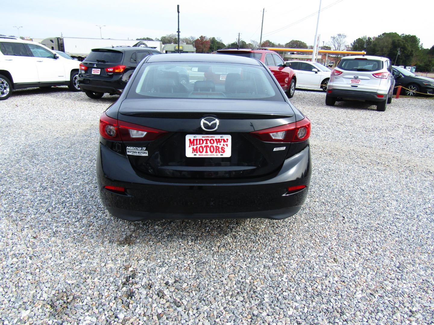 2018 Black /Black Mazda MAZDA3 s Touring AT 4-Door (3MZBN1V30JM) with an 2.5L L4 DOHC 16V engine, Automatic transmission, located at 15016 S Hwy 231, Midland City, AL, 36350, (334) 983-3001, 31.306210, -85.495277 - Photo#6